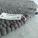 Beaver Brown Felt Ball Rug