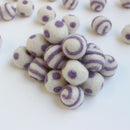 lavender on white polka dot swirl felt balls