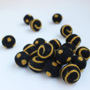 Polka Dot Swirl Felt Balls Gold On Black