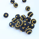 Polka Dot Swirl Felt Balls Gold On Black