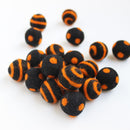 Polka Dot Swirl Felt Balls Orange On Black