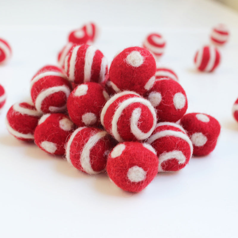 white on red polka dot swirl felt balls
