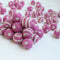 white on pink polka dot swirl felt balls