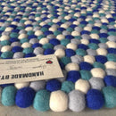 blue felt ball rug